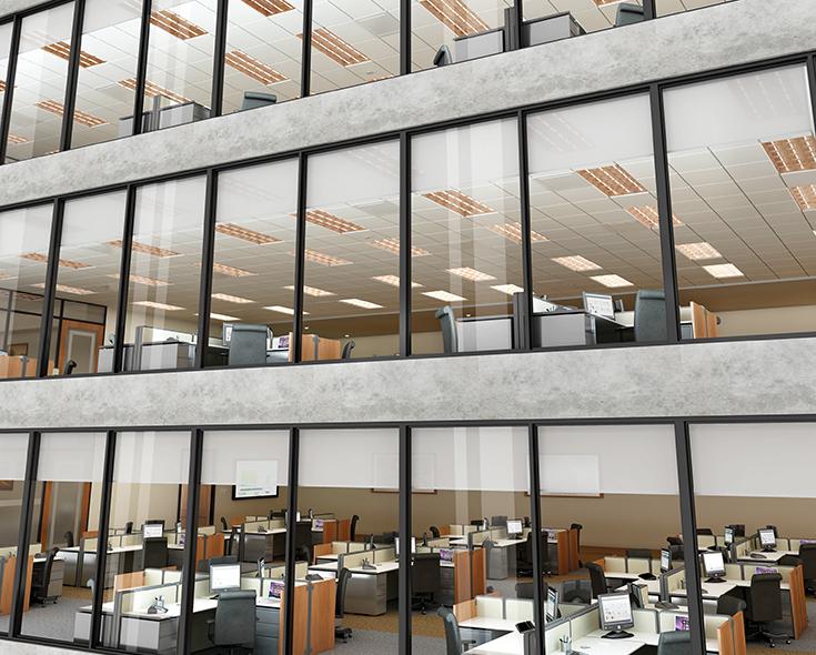 Lighting controls in an office building with desks